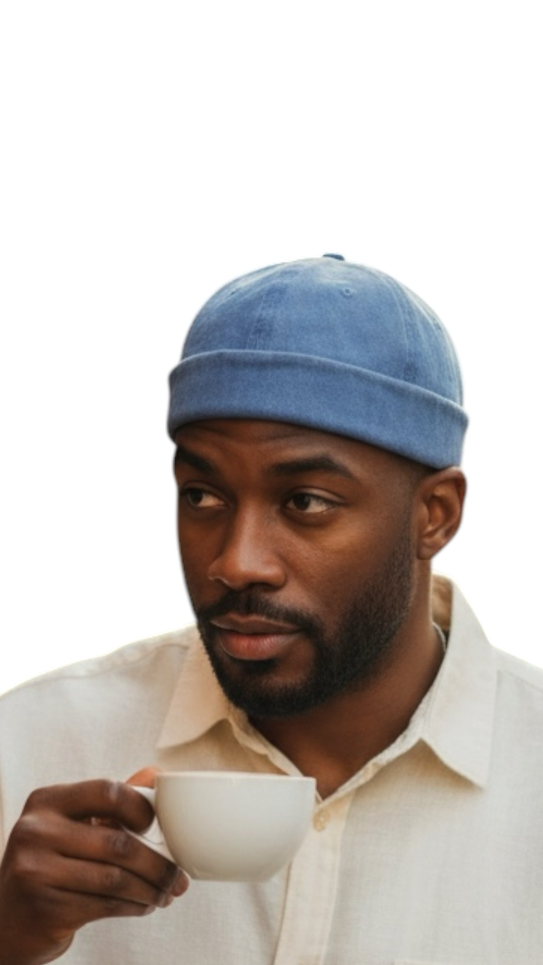 Peacefulcornerapparel distressed blue cotton docker hat on a man holding a white coffee cup.